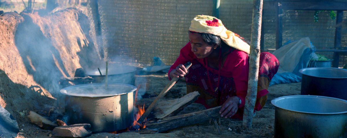 Nepal woman and fire